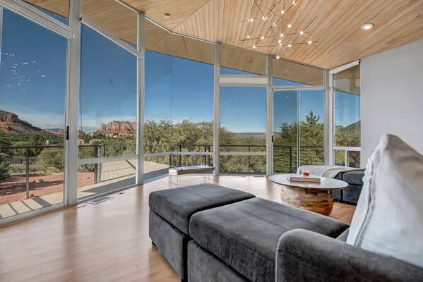 Upper Living Room Offers Floor to Ceiling Windows to Enjoy the Views!