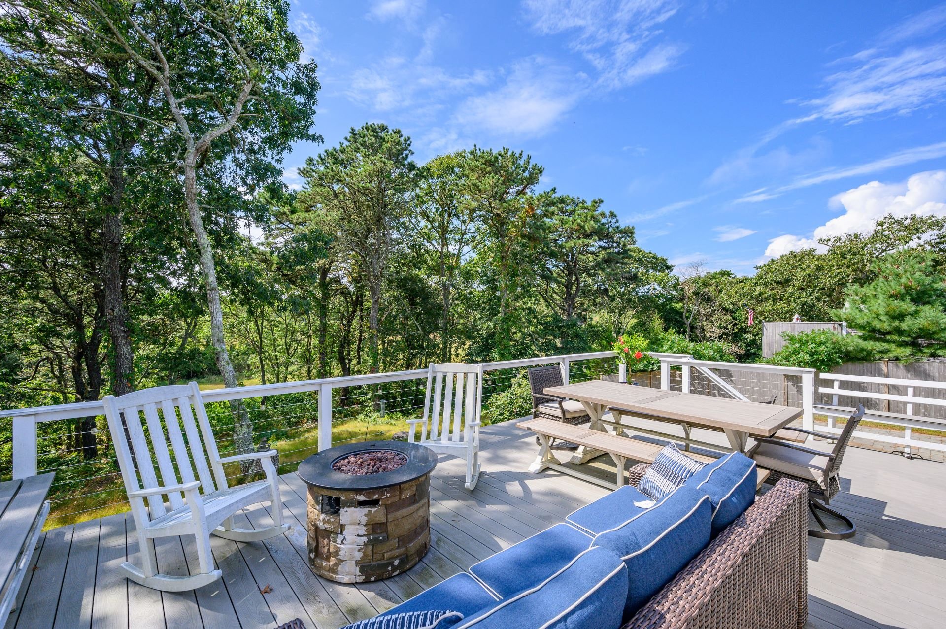 Spacious outdoor living area on upper deck- 135 Pine Knoll Avenue Chatham Cape Cod - Sarah-N-Dipity - NEVR