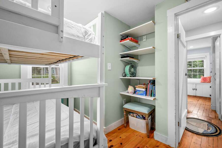 Second bedroom with full over full bunk beds, book shelves-135 Pine Knoll Avenue Chatham Cape Cod - Sarah-N-Dipity - NEVR