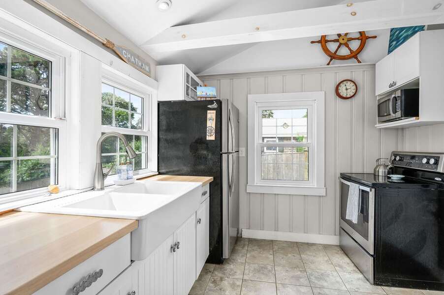Kitchen with large sink overlooking the marsh- 135 Pine Knoll Avenue Chatham Cape Cod - Sarah-N-Dipity - NEVR
