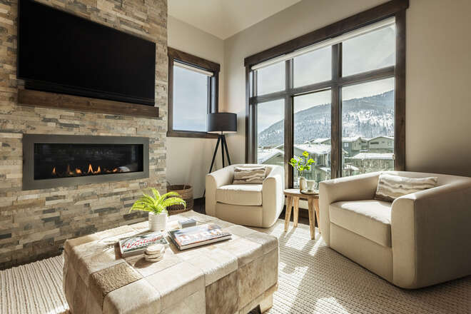 Living room with a cozy gas fireplace