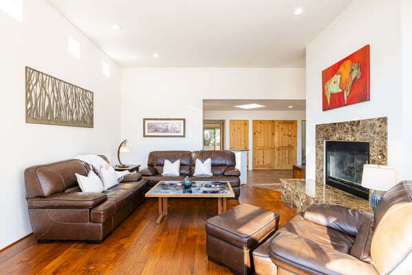 Living Room with Leather Furnishings, Gas Fireplace and Smart TV