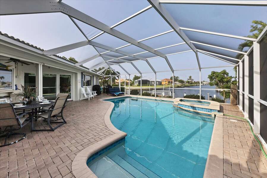 Gorgeous, west facing, pool and spa with beautiful canal view