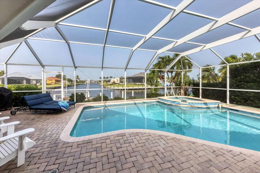 Gorgeous, west facing, pool and spa with beautiful canal view