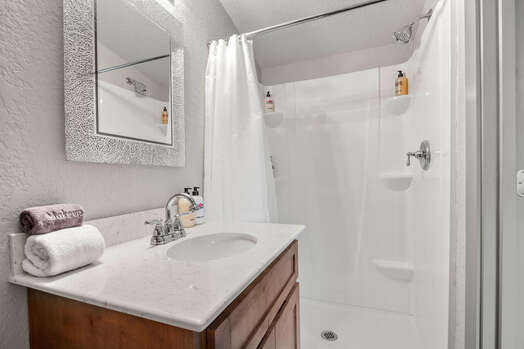 En Suite Bathroom with Vanity and a shower