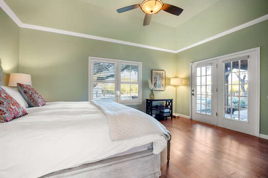 Master Bedroom with King Bed and Private Access to Backyard