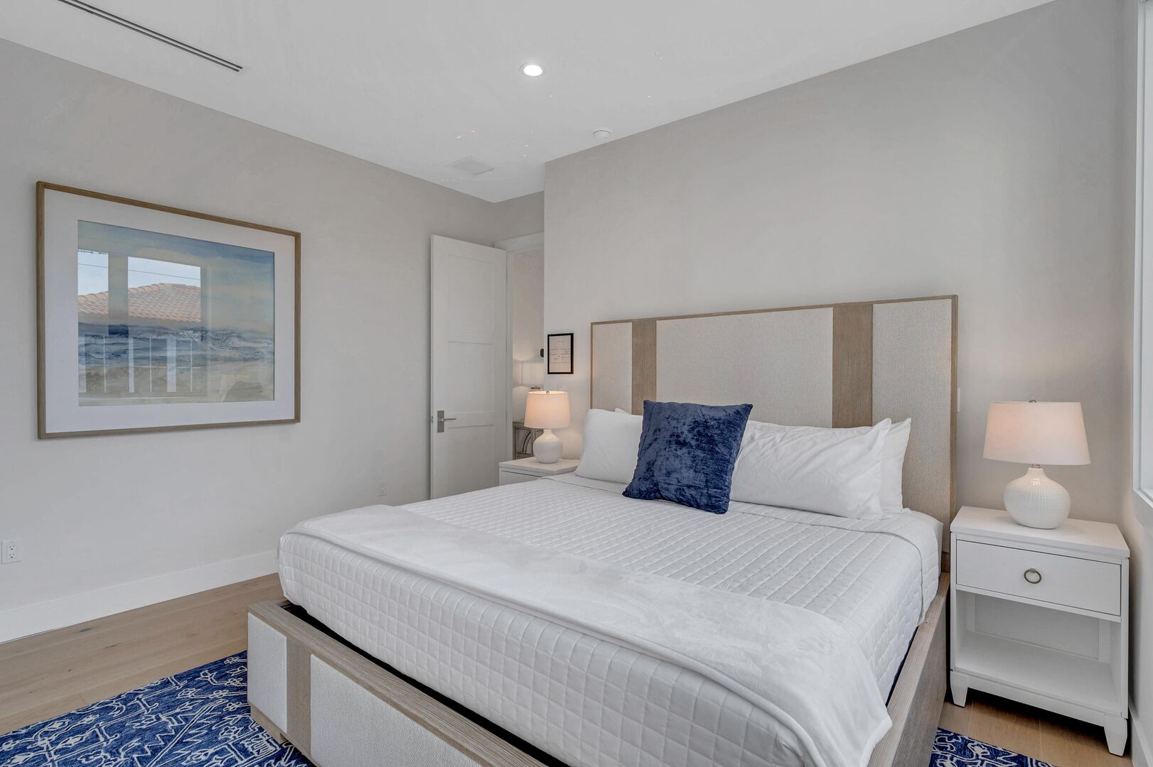 Bedroom Two is located on the third floor featuring a king size bed an ensuite bathroom.