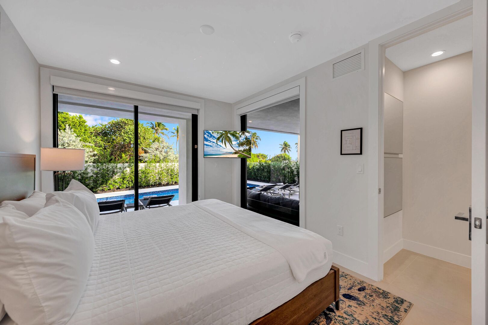 Bedroom Seven is located on the ground floor and boasts swimming pool views. Features a king size bed and ensuite bathroom.