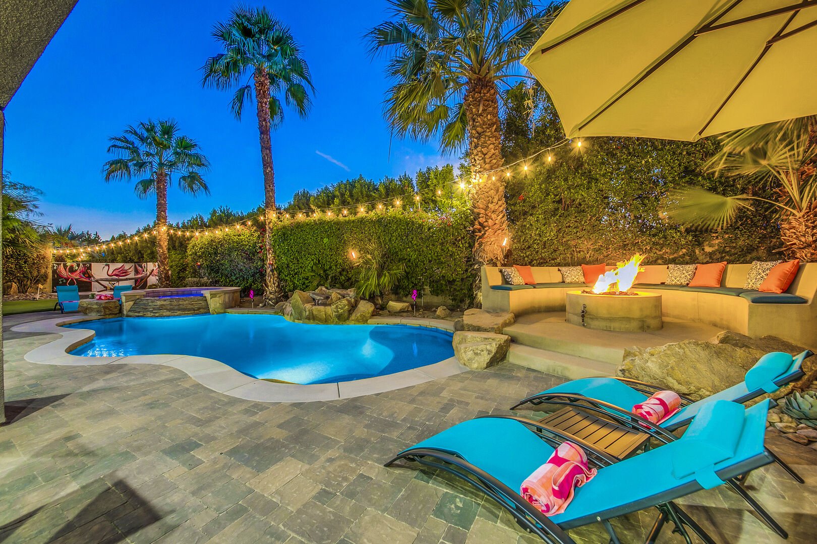 The backyard is made to entertain! Lounge out, swim laps, or relax in the spa. 