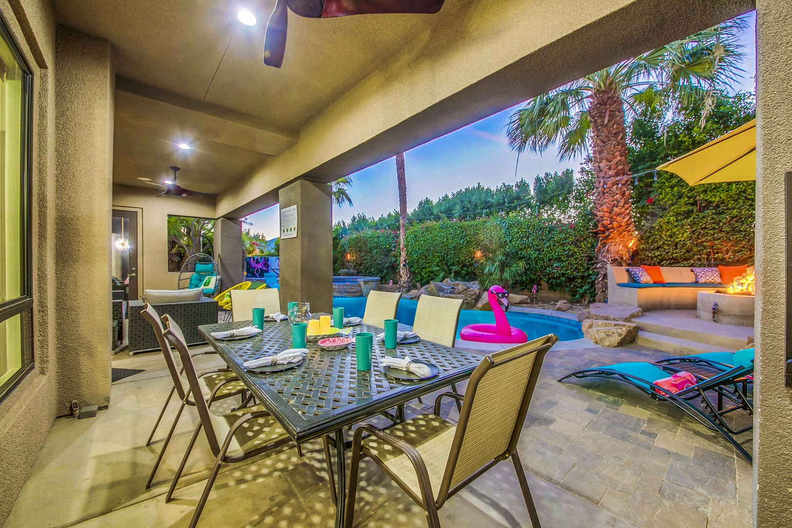 Dine on the outdoor dining table with seating for six. All dinnerware provided.