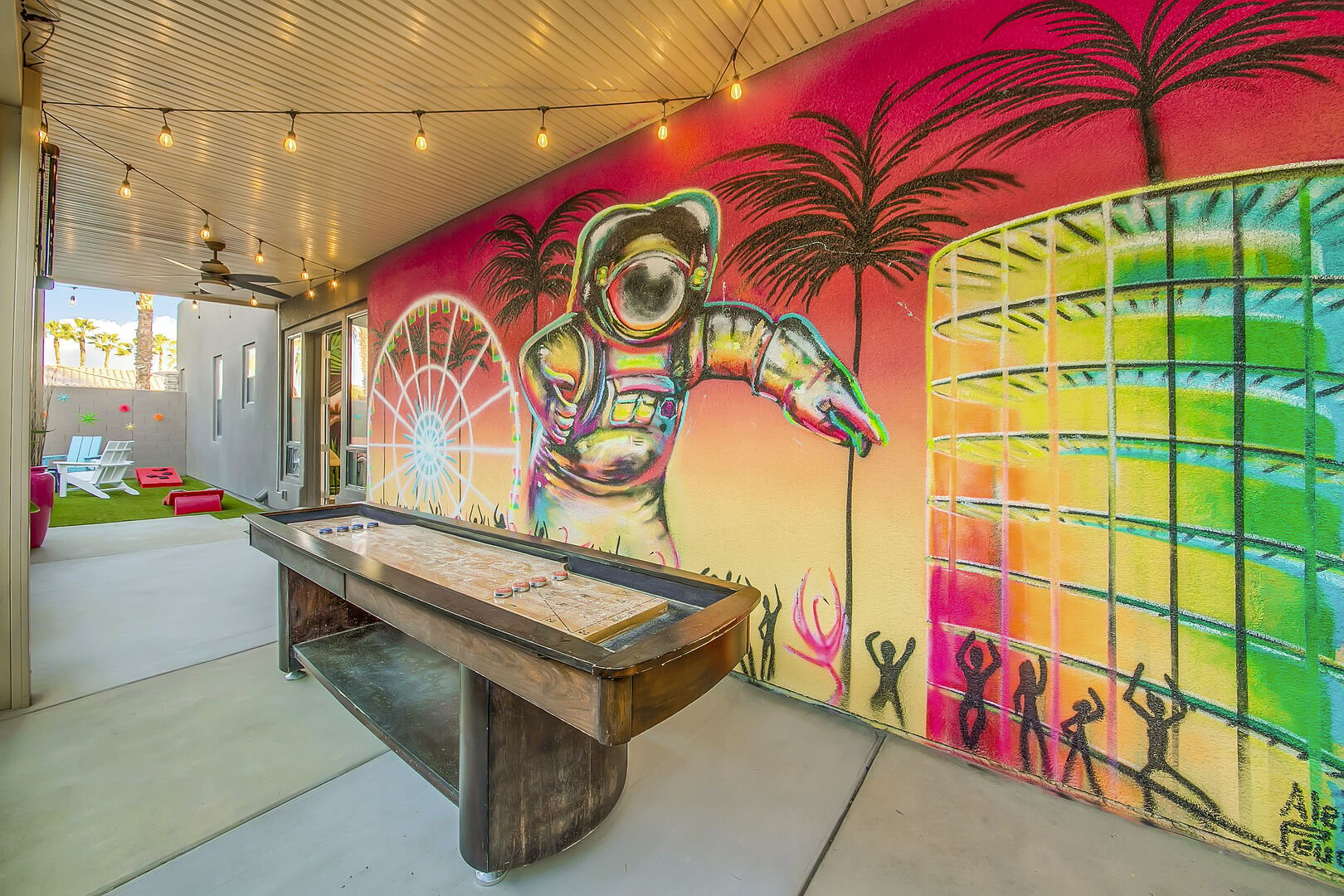 Enjoy playing on the shuffleboard table with your loved one and don't get to distracted with the beautiful view of the mural!