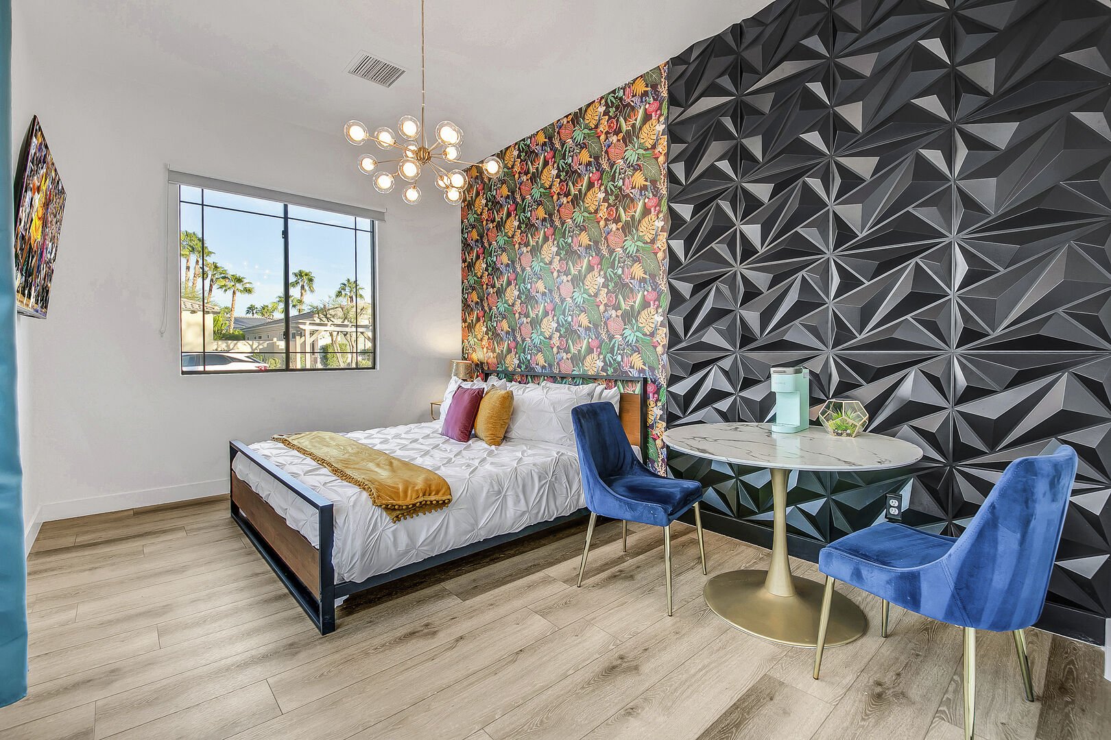 Casita Suite 3 features a King-sized Bed, 58-inch HiSense with Roku Smart television and a reach-in closet with access to the front courtyard.