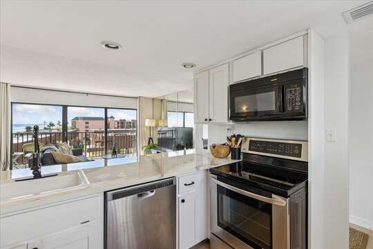Fully stocked and open kitchen with oceanview