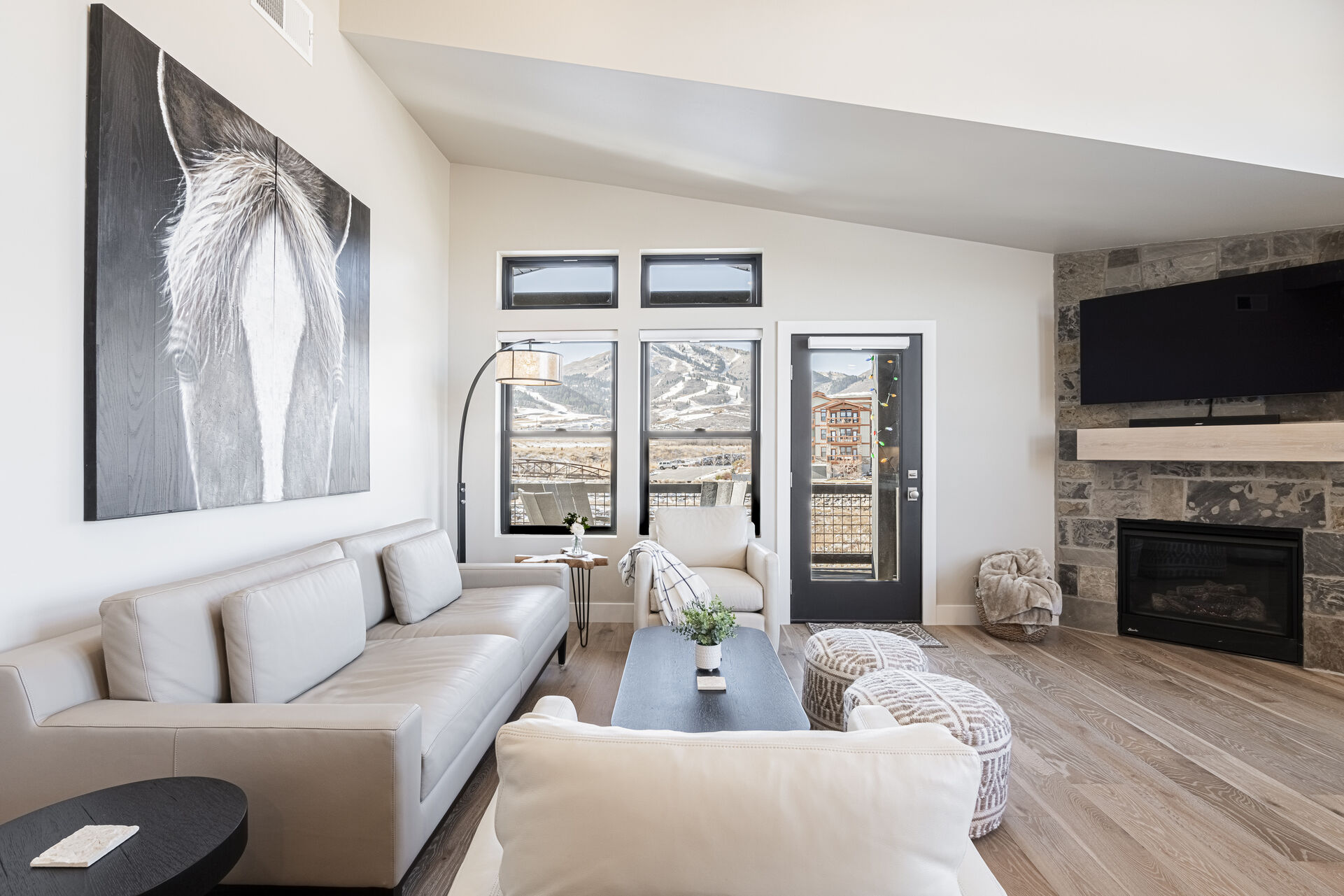 Cozy living room with ski resort views