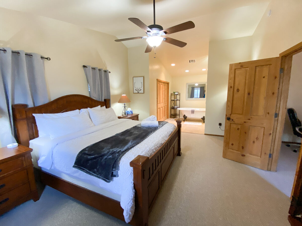 The Master Suite has the floor to itself. Boasting a king-size bed and comfortable linens