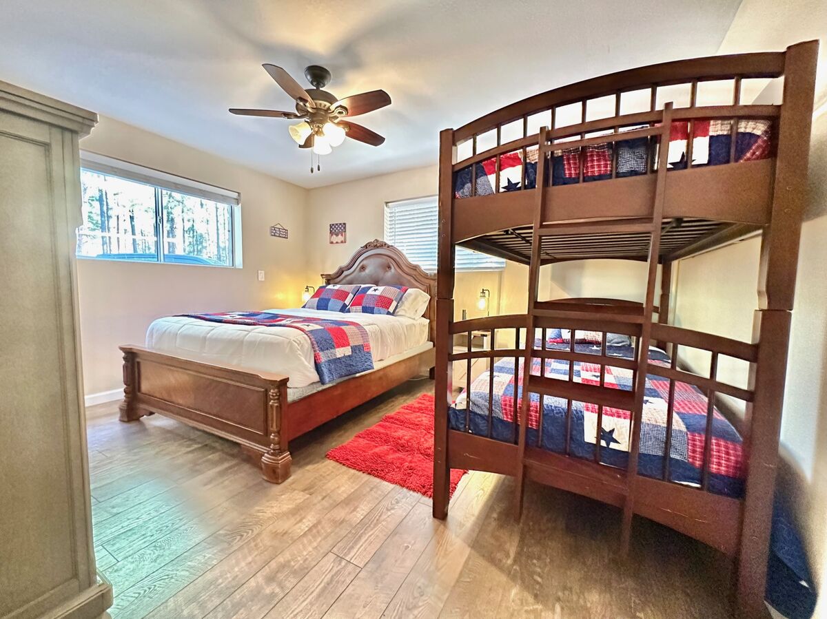 Bedroom 1 includes comfy queen and twin size bunks