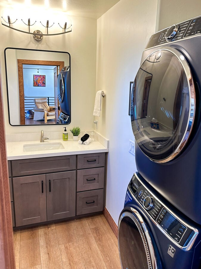 Guest bath includes full-size washer & dryer for extended stays