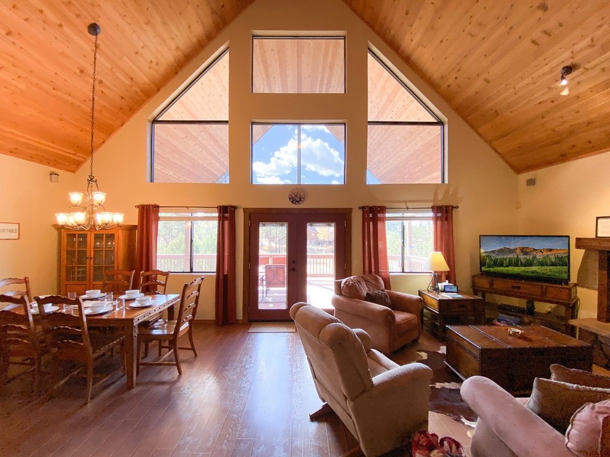Welcome to Deer Ridge Retreat with this vaulted ceiling and floor to ceiling views