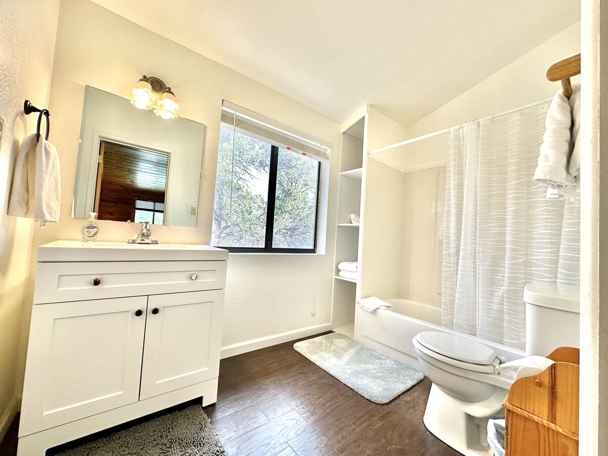 Upstairs bathroom includes shower/tub combo, plus all the toiletries you may need.