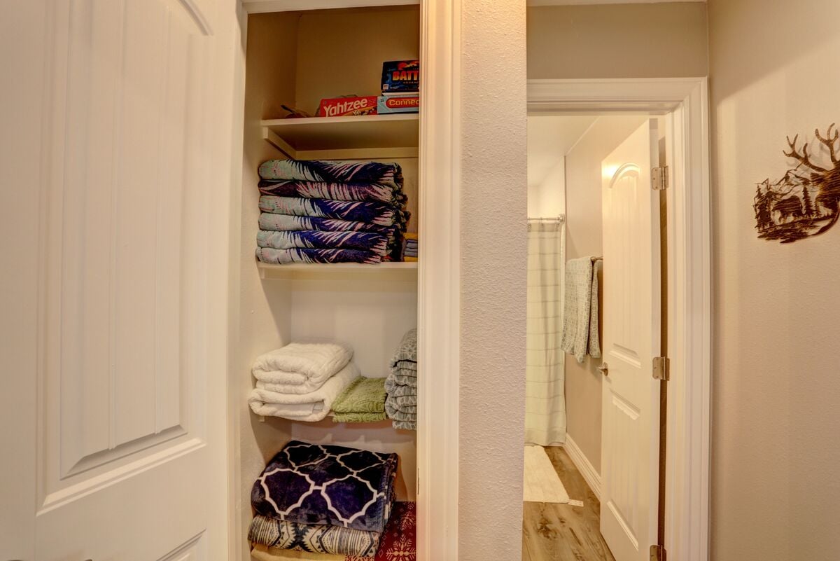 Plenty of towels provided right outside the bathroom.