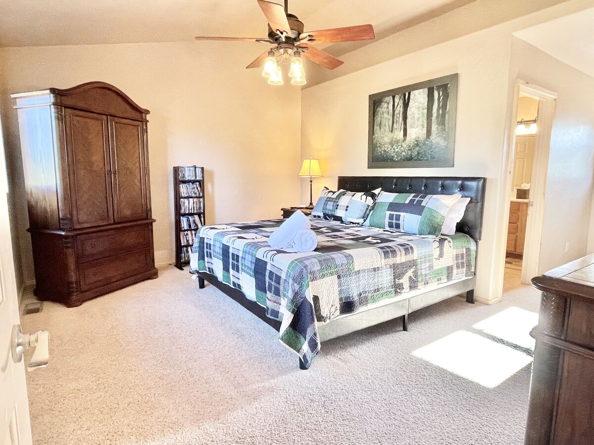Master Bedroom boasts King-size bed and Smart TV