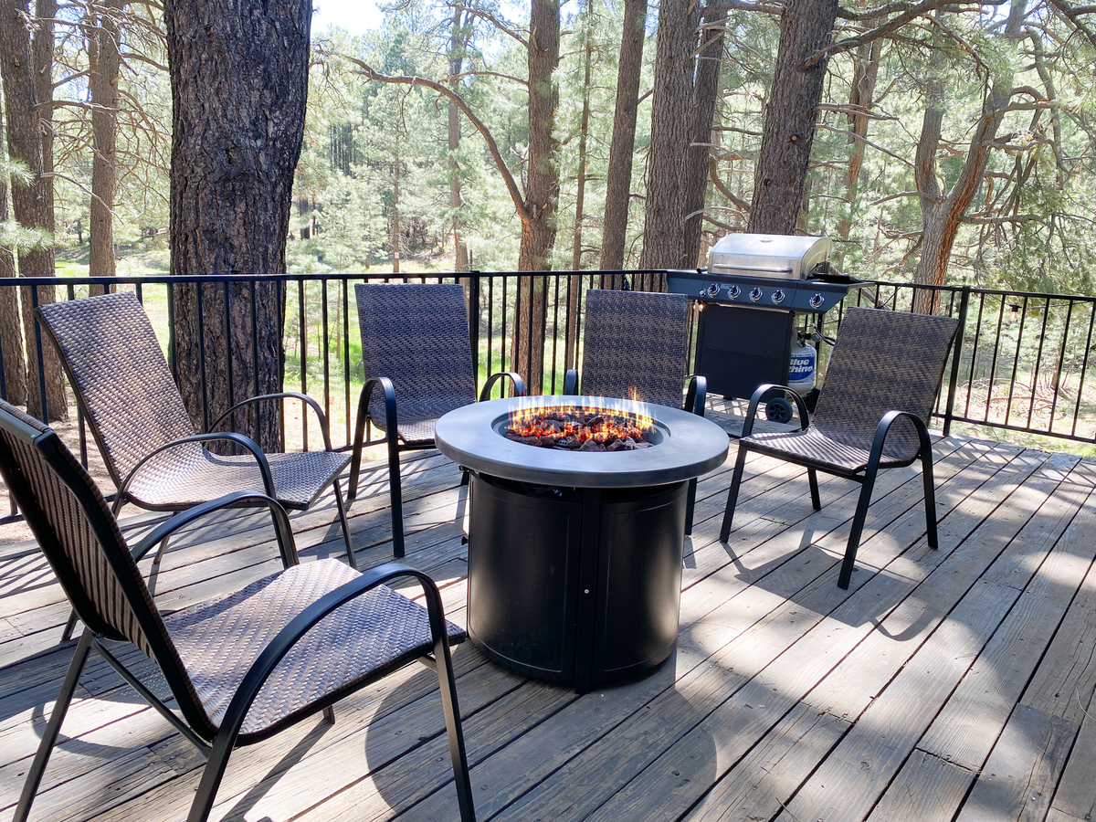 Propane fire table and BBQ grill on the open deck