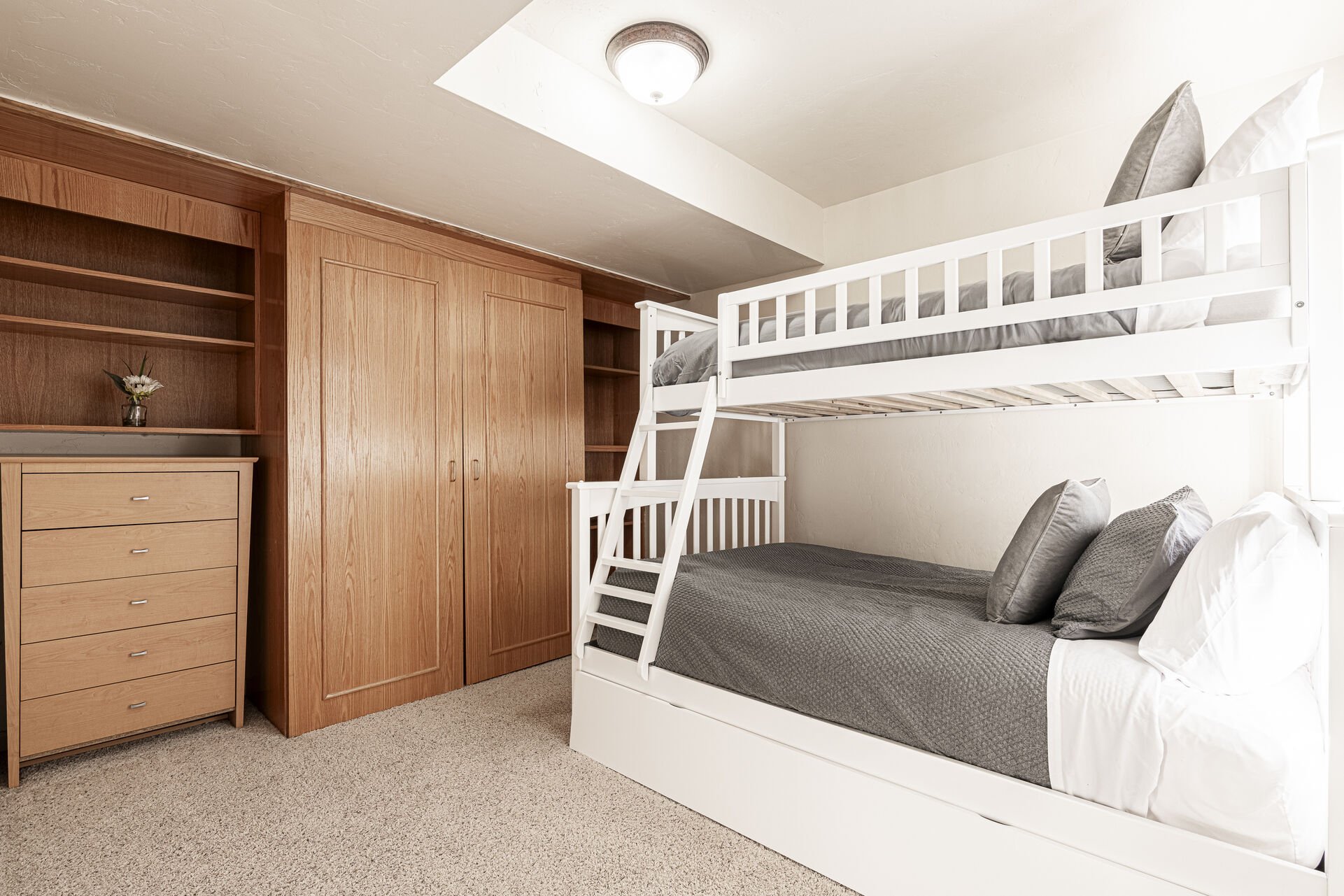 Bedroom 2 with Twin Over Full Bunk Beds with a Twin Trundle, and Access to Full Shared Bath