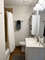 Main ensuite bathroom with shower/tub combo