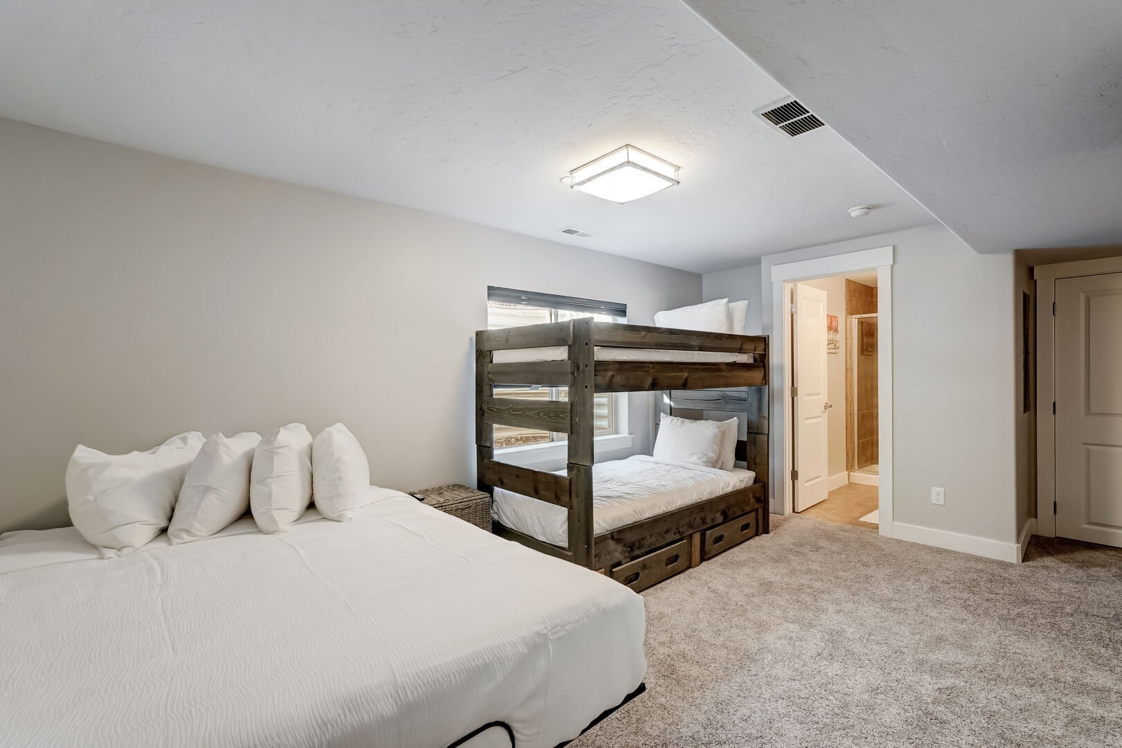 Bedroom 2 with 1 Queen Bed & Twin-over-Twin Bunk Bed (Located in Basement)