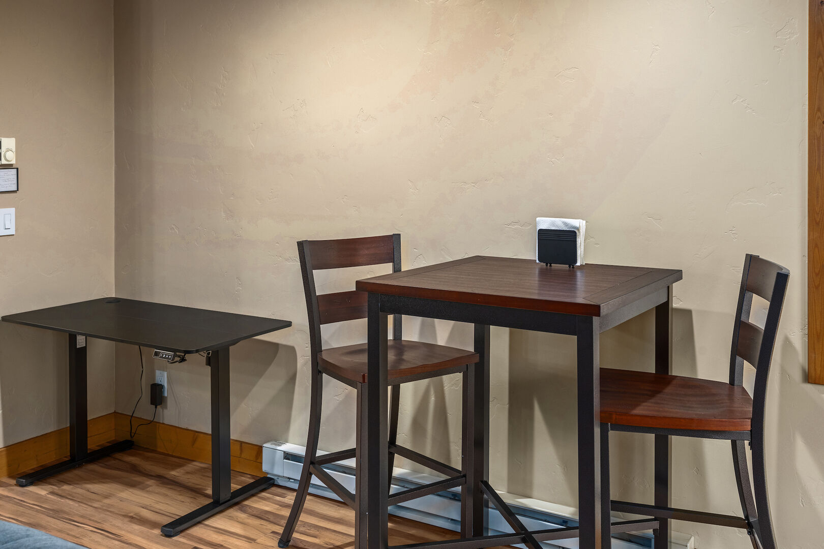 Small dining table can be pulled away from the wall and more seating added