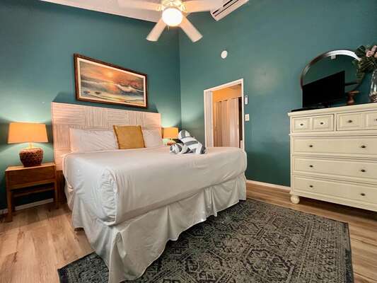 Relax on your king-size bed in the master's bedroom!