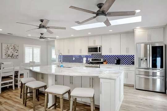 Comfortably cook and relax in this spacious bright kitchen.