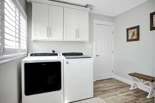 Laundry room w/washer & dryer.