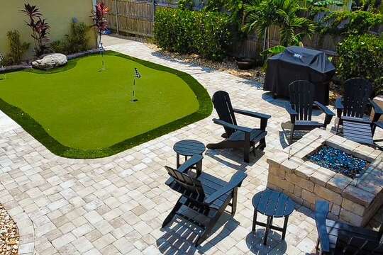Putting green, firepit, and outdoor BBQ, this home as it all and then some!