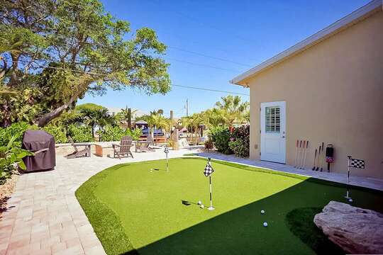 Putting green and outdoor BBQ.