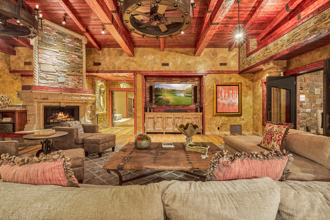 The high ceilings, fireplace, and entertainment spaces are ready to welcome you.