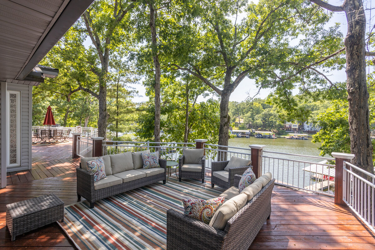 Deck access from the master bedroom opens not only to a nice view of the lake, but a perfect place for a morning coffee or to gather around.