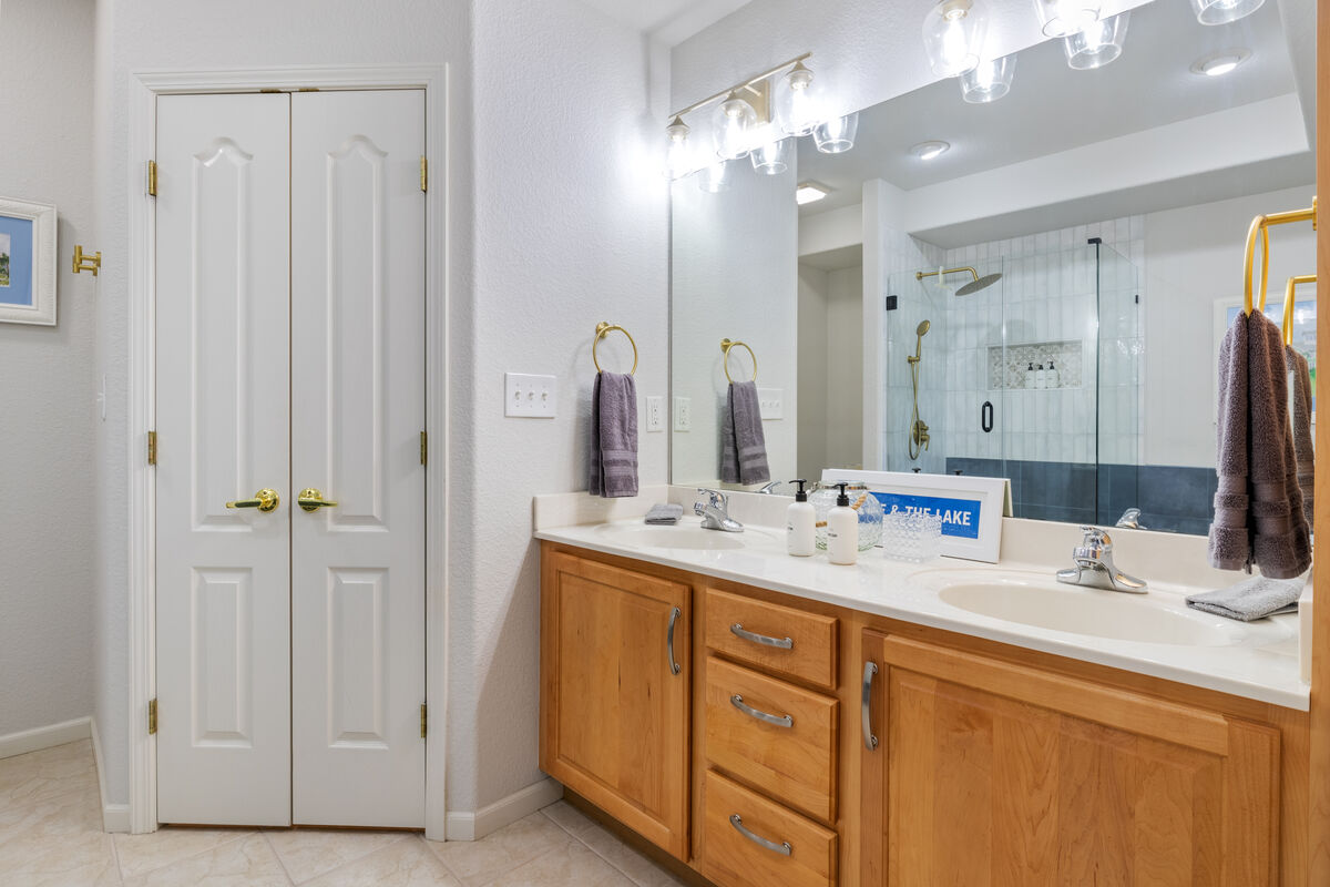 Surrounded by the convenience of double sinks and storage.