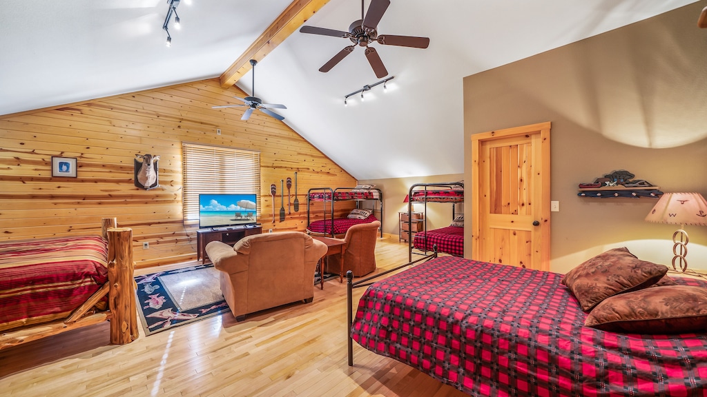 Lodge style woodwork and high ceilings make the Bunk Room a comfortable space.
