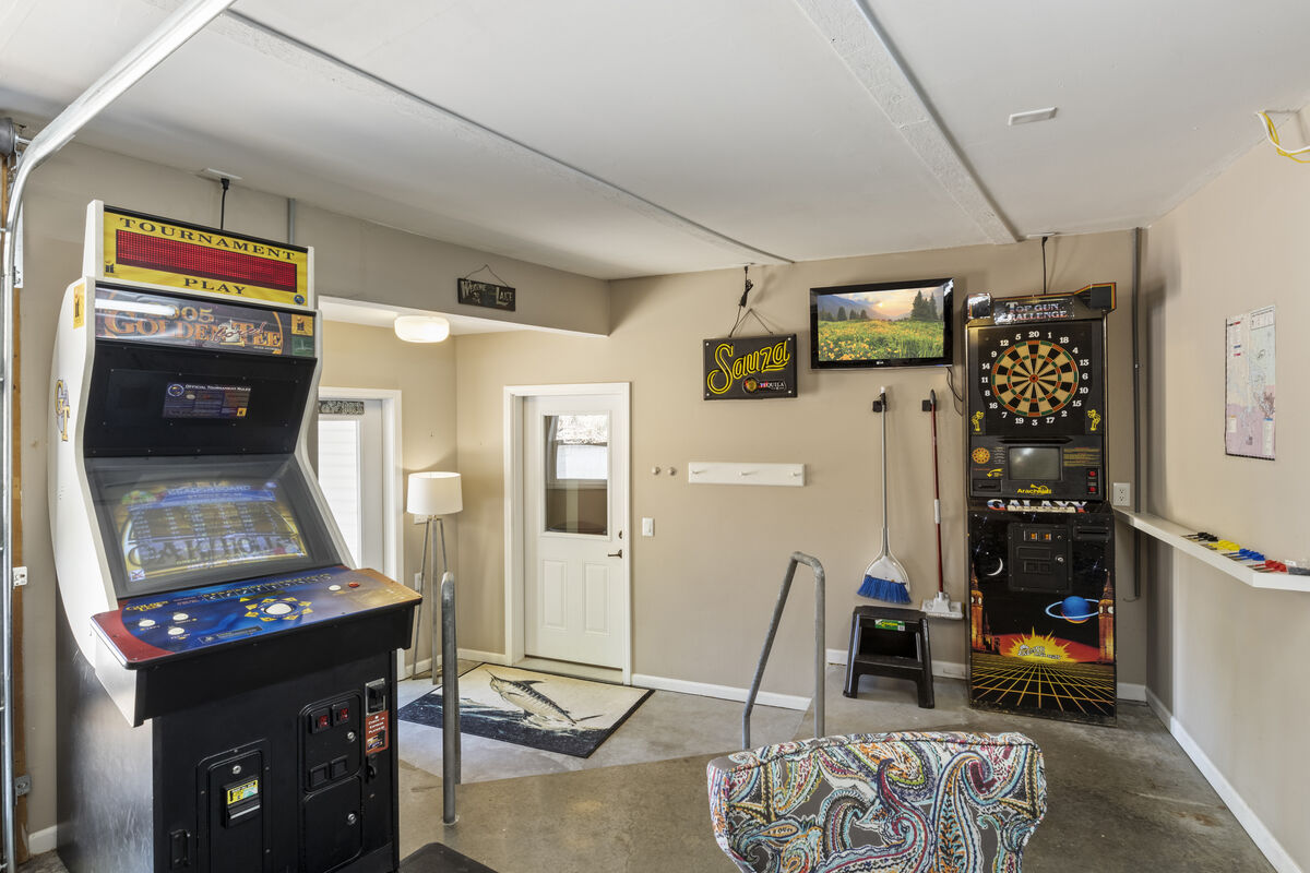 Darts, Giant Jenga, Pool Table, Cornhole Game and Golden Tee- all these available in the game room!
