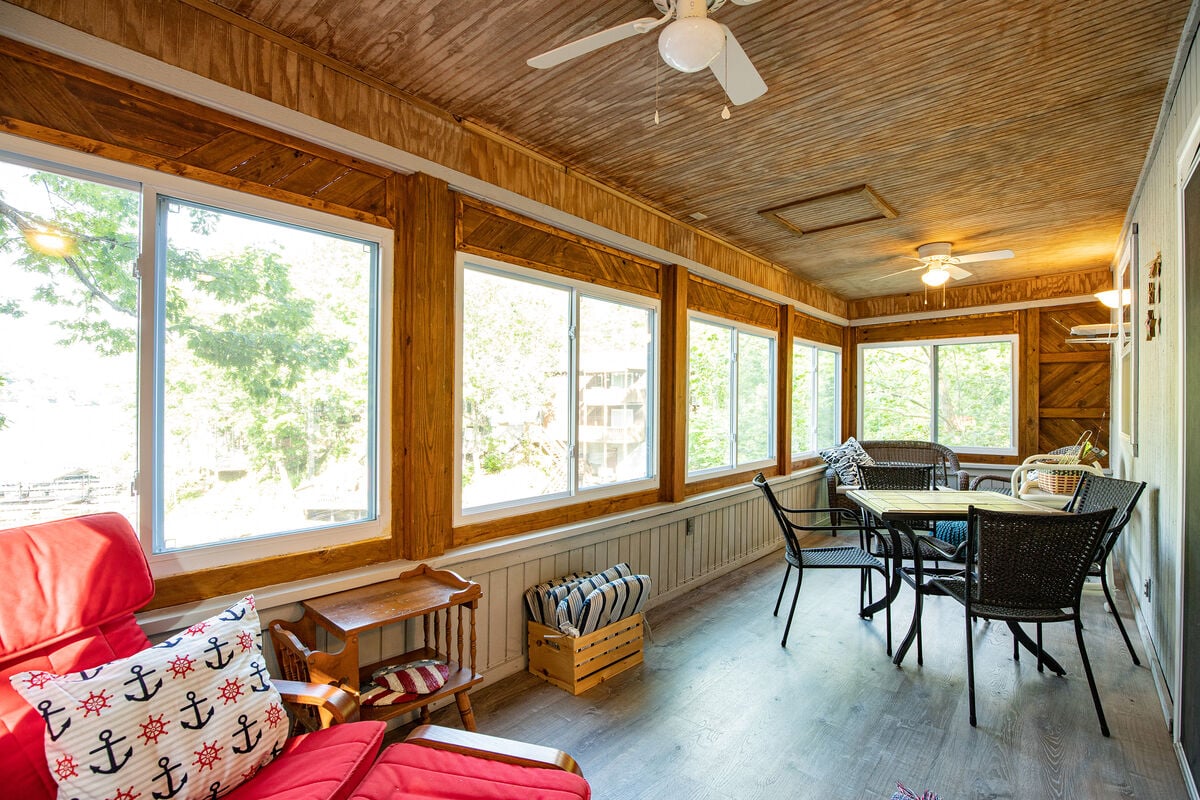 The Sun Room is a perfect place to enjoy the lake in all weather.
