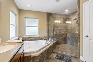 Master bathroom with huge soaker tub and separate shower.