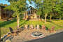 Great outdoor space with shade, level lot & lakefront firepit