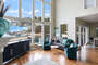 Smart TV for your Streaming Enjoyment. Such incredible light with the windows complimenting the space