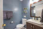 Bathroom with tub / shower in upper level area