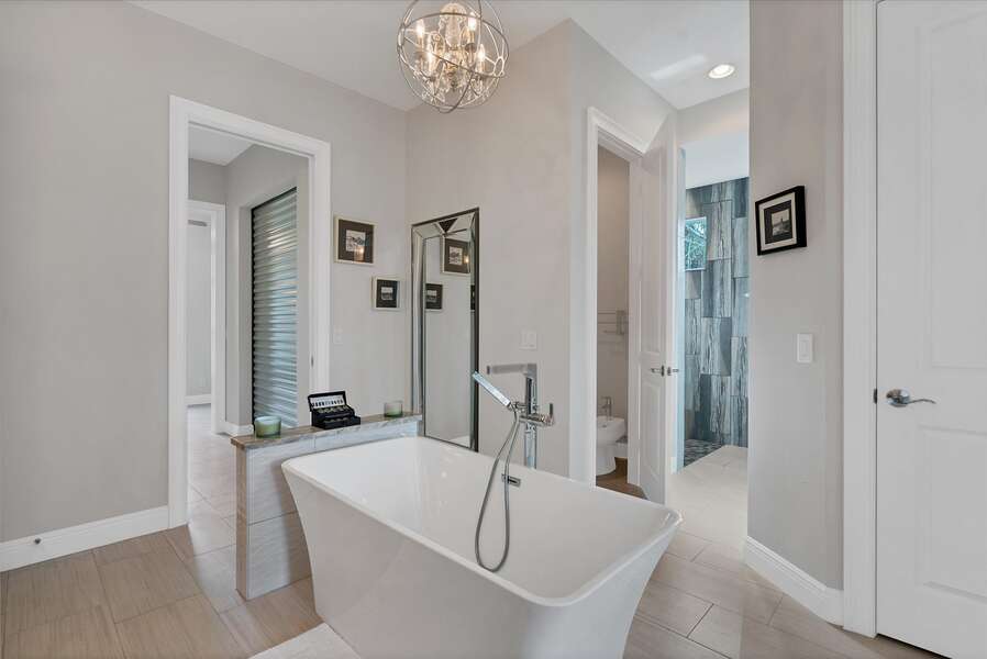 Large, beautiful ensuite featuring soaking tub, double vanities, large closet and walk-shower