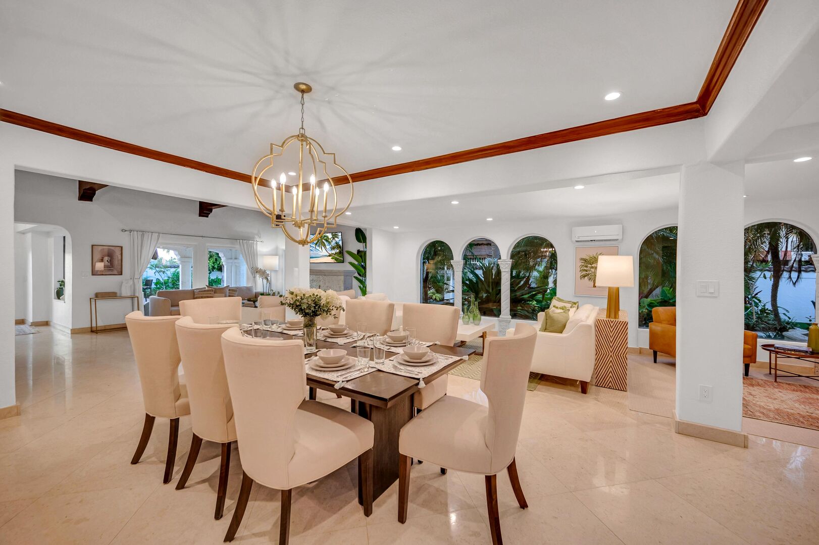The dinning area, located in the middle of the open-concept living area sits eight.