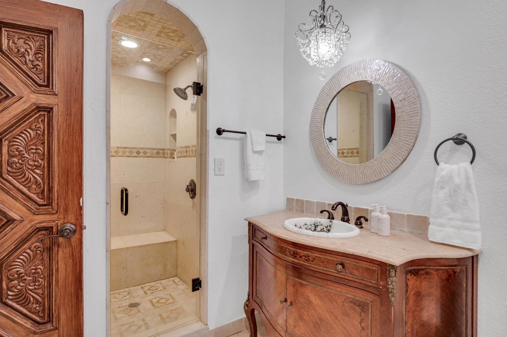 The primary bathroom features a walk-in shower.