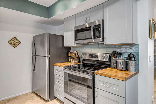 Fully Equipped Kitchen Featuring Stainless Appliances