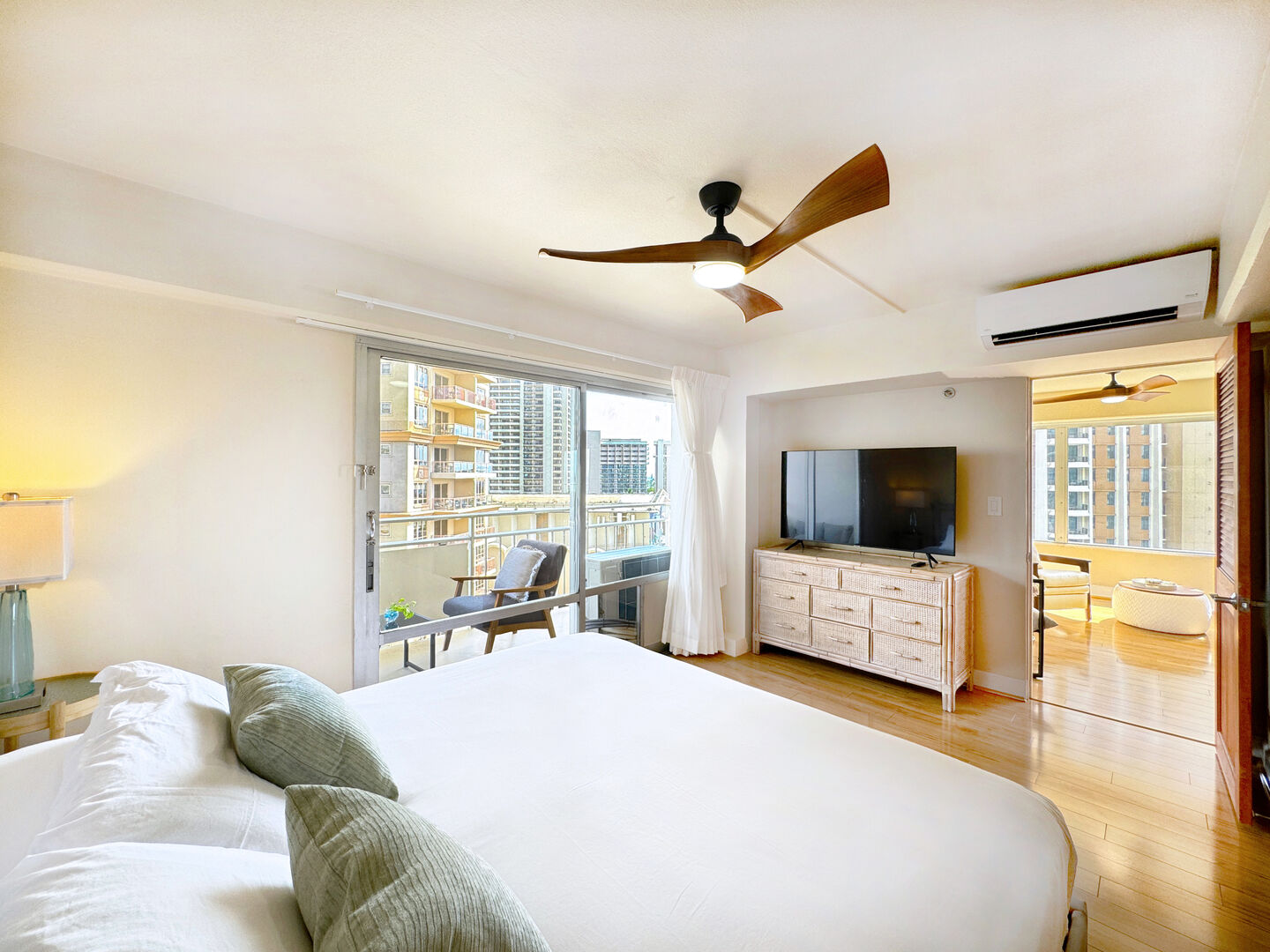 The master bedroom with king-size bed and Samsung smart TV.